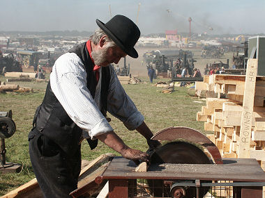 Steam powered saw bench